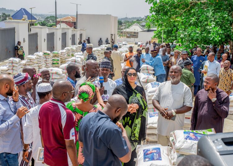 Senator Natasha distributes six trucks of grains to constituents