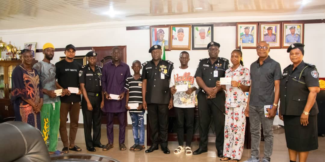 Kogi CP presents cheques over ₦13 Million naira to seven families of fallen heroes.