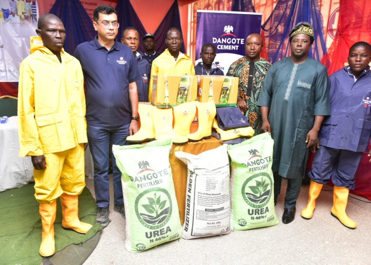 Food Production: Minister lauds Dangote Cement over farmers’ empowerment