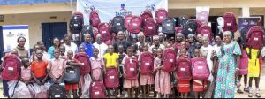 Pupils of UBE LGEA School, St. Luke Model II, Adankolo, Lokoja Local Government Area during the distribution ceremony of educational materials by the Dangote Cement Plc at the weekend. 
